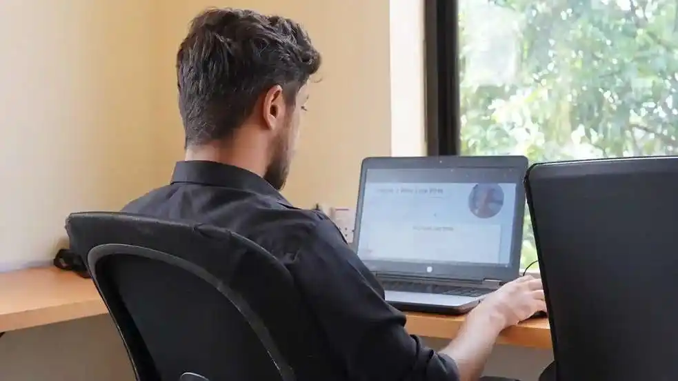 Instructor guiding students at Uptech Bootcamp 4